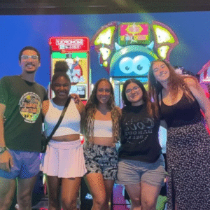College student with friends during a semester off, combining travel and work for personal growth and professional development.