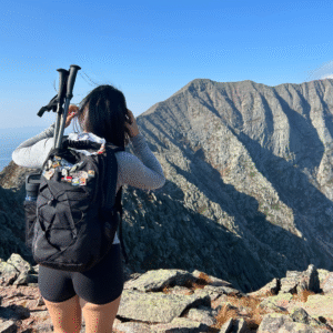 From Traveler to Earner: How to Keep the Adventure Going (and Start Getting Paid) Gap year students working at a resort, smiling and exploring the mountains together.