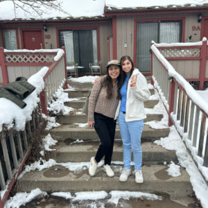 Young adults on a structured gap year program working in the mountains, smiling and learning through travel.