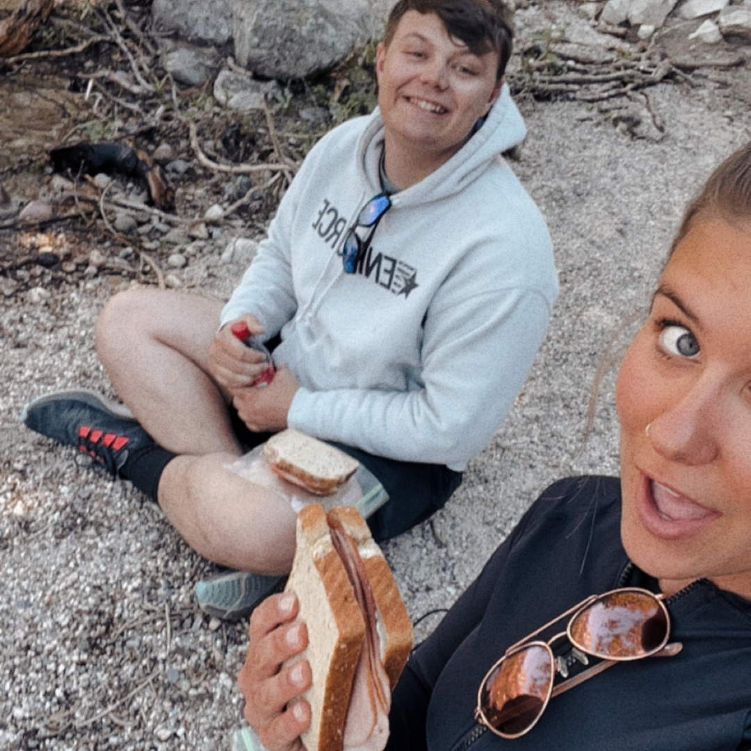 What’s Really Missing for Our Kids—And How a Gap Year Builds Confidence, Community & Purpose Students eating lunch during their adventure semester in nature.