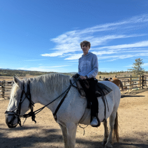 Young traveler working at a mountain lodge during their paid travel experience