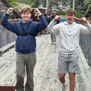 Young adults exploring a new destination together during a structured travel and work experience designed to build confidence and independence.
