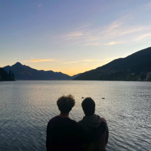 Why a Gap Year Work Experience Could Be the Best Decision You Ever Make Two young graduates smiling confidently outdoors during a gap year work experience program abroad and thinking about their future.