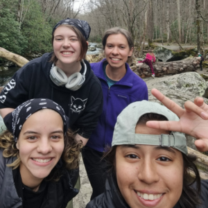Young adult working in a travel destination instead of a student working at an office internship.