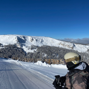 Student working and exploring a new destination while gaining real-world experience through travel.