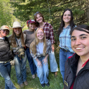 A group of 20-year-olds exploring a scenic destination after work, laughing together while building friendships, confidence, and life experience.
