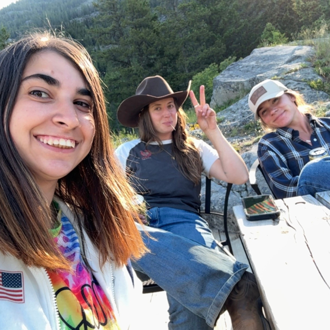 Young adults from different backgrounds talking and sharing experiences while traveling and living together in a new destination.