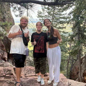 Young people having fun in nature during a travel and work experience that is affordable.